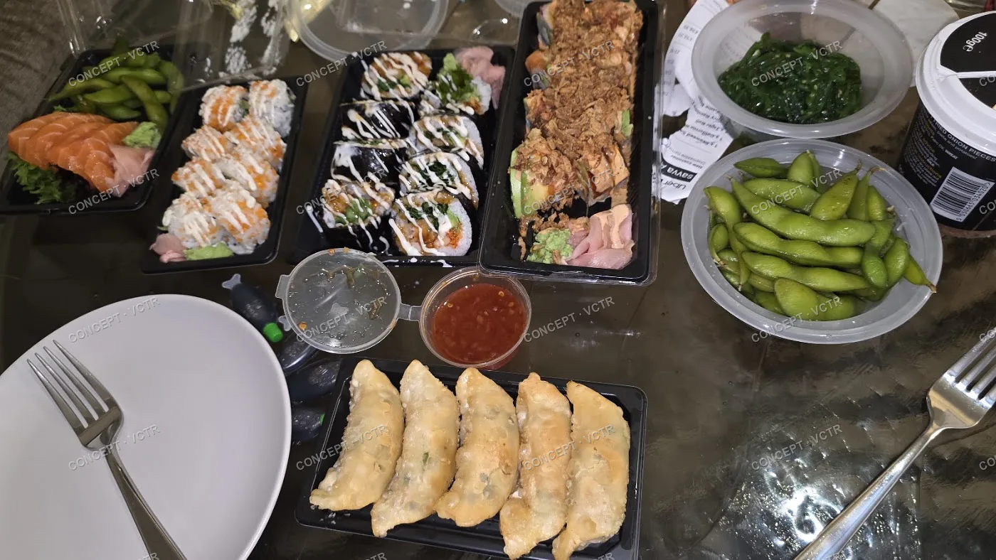 Yokisa sushi, gyoza and edamame laid out for a meal